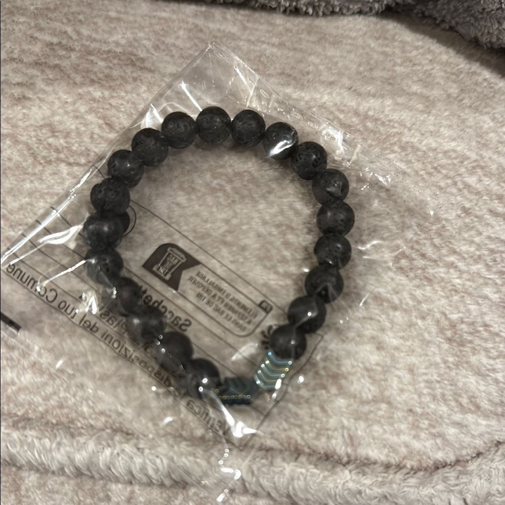 Stylish Black Beaded Bracelet with Green Accent